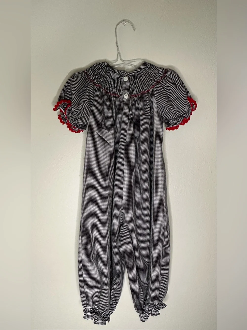 Smockadot Kids 9 month size with ladybug smocking with snap crotch .